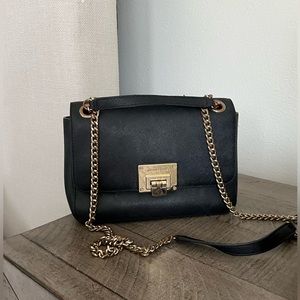 Black and gold Michel kors purse! Worn but in great condition